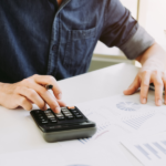 Finance professional reviewing reports with fta compliant invoicing software for PINT AE UAE e-invoicing compliance