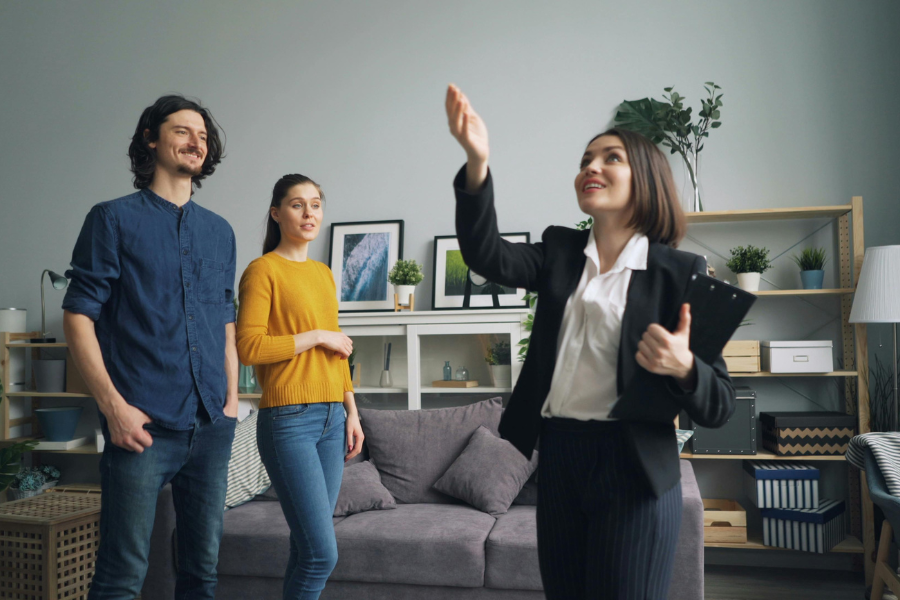 E-Invoicing for Construction and Real Estate: What Retention Billing Rules Actually Mean for You 2 real estate agent showing property